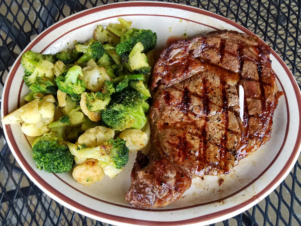 Plated broccoli with steak